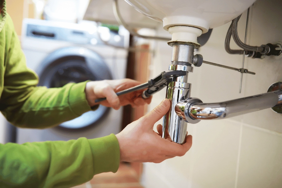 repairing a sink and plumbing issues in a home 